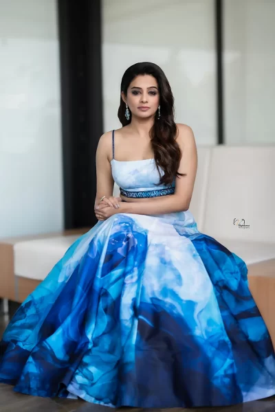 White Printed Imported Crepe Embroidered Blouse with Shaded Blue Embroidered Lehenga and Teal Blue Net Scallop Embroidered Dupatta with mirror work