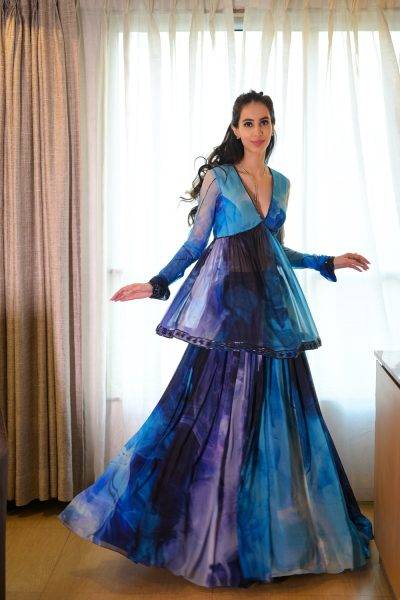 Shaded Blue Printed Embroidered Peplum Top with matching Printed Chiffon Embroidered Lehenga and Navy Blue Net Embroidered Dupatta