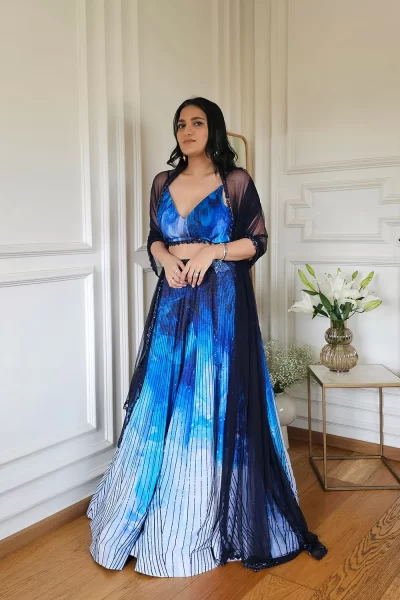 Blue Shaded Chiffon Embroidered Blouse with Blue Imported Crepe Sequin Embroidered Heavy Lehenga and Navy Blue Embroidered Net Dupatta