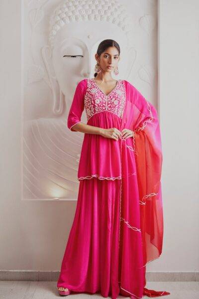 Fuchsia Pink Cutdana Embroidered Crepe Peplum Kurti with matching Fuchsia Pink Crepe Palazzo and Shaded Pink and Red Embroidered Scallop Organza Dupatta