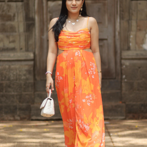 Nikita Madhani In Yellow/Orange Printed Jumpsuit
