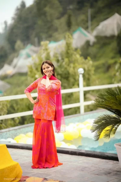 Pink Satin Silk Embroidered Short Kurti with matching Printed Georgette Sharara and Pink Scallop Embroidered Net Dupatta