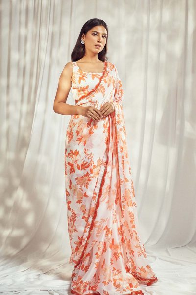 White Floral Printed Georgette Satin Self Scallop Blouse with matching Saree with Orange Scallop lace detailing