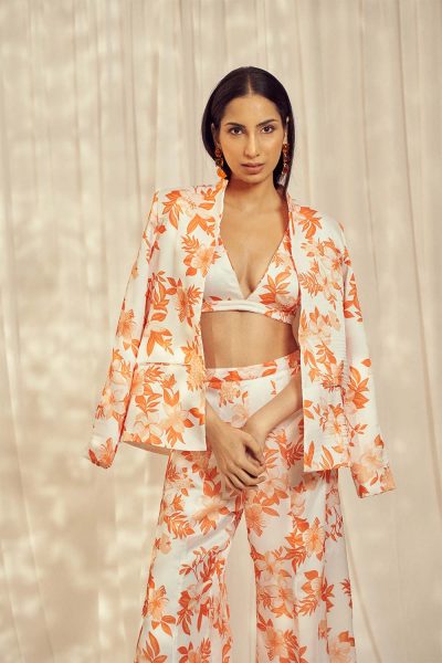 White Floral Printed Georgette Satin Blazer with Green Silk Bustier and matching Baby Pink Georgette Satin Palazzo